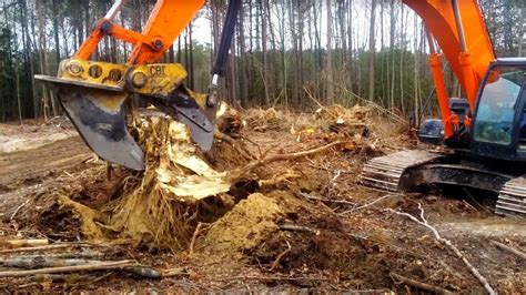 mini excavator for tree removal|deep stump removal machine.